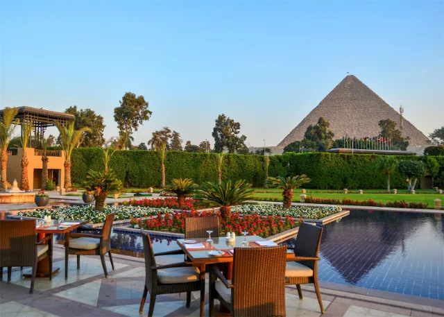 The Marriott Mena House gardens with the Great Pyramid behind