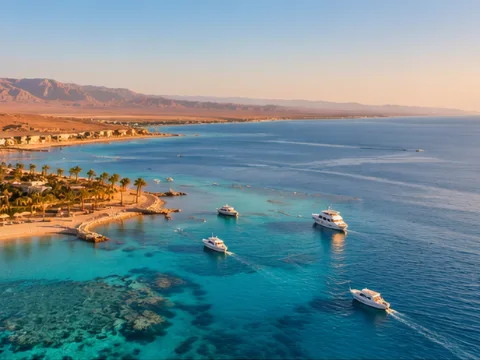 The Red Sea coast from the air, boats over the reef