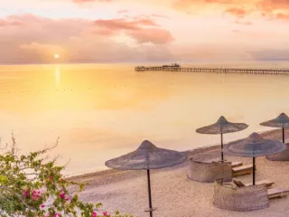 A Red Sea beach and jetty at Hurghada in evening light